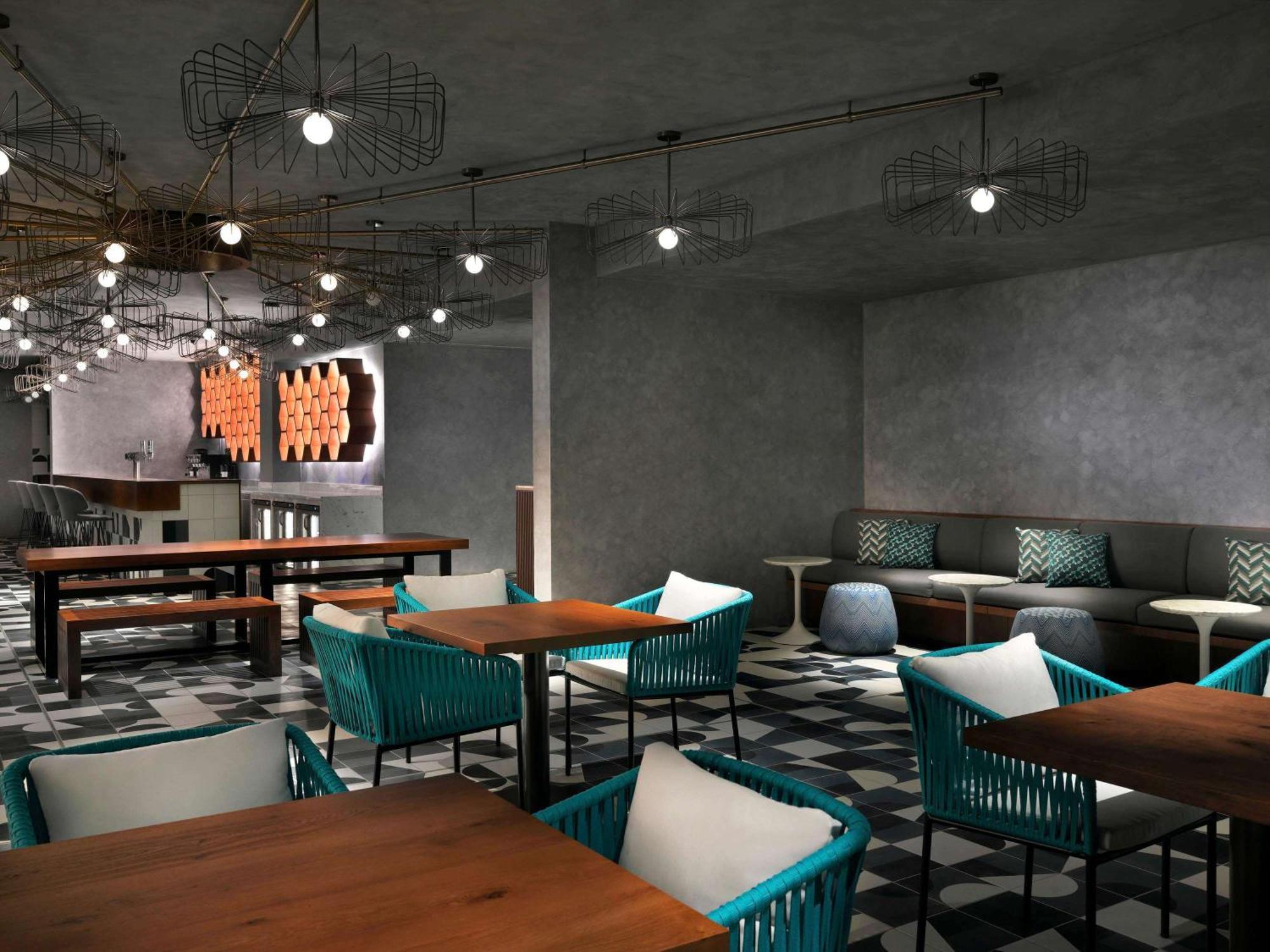 Moevenpick Hotel & Apartments Ghala Maskat Exteriér fotografie The interior of the restaurant