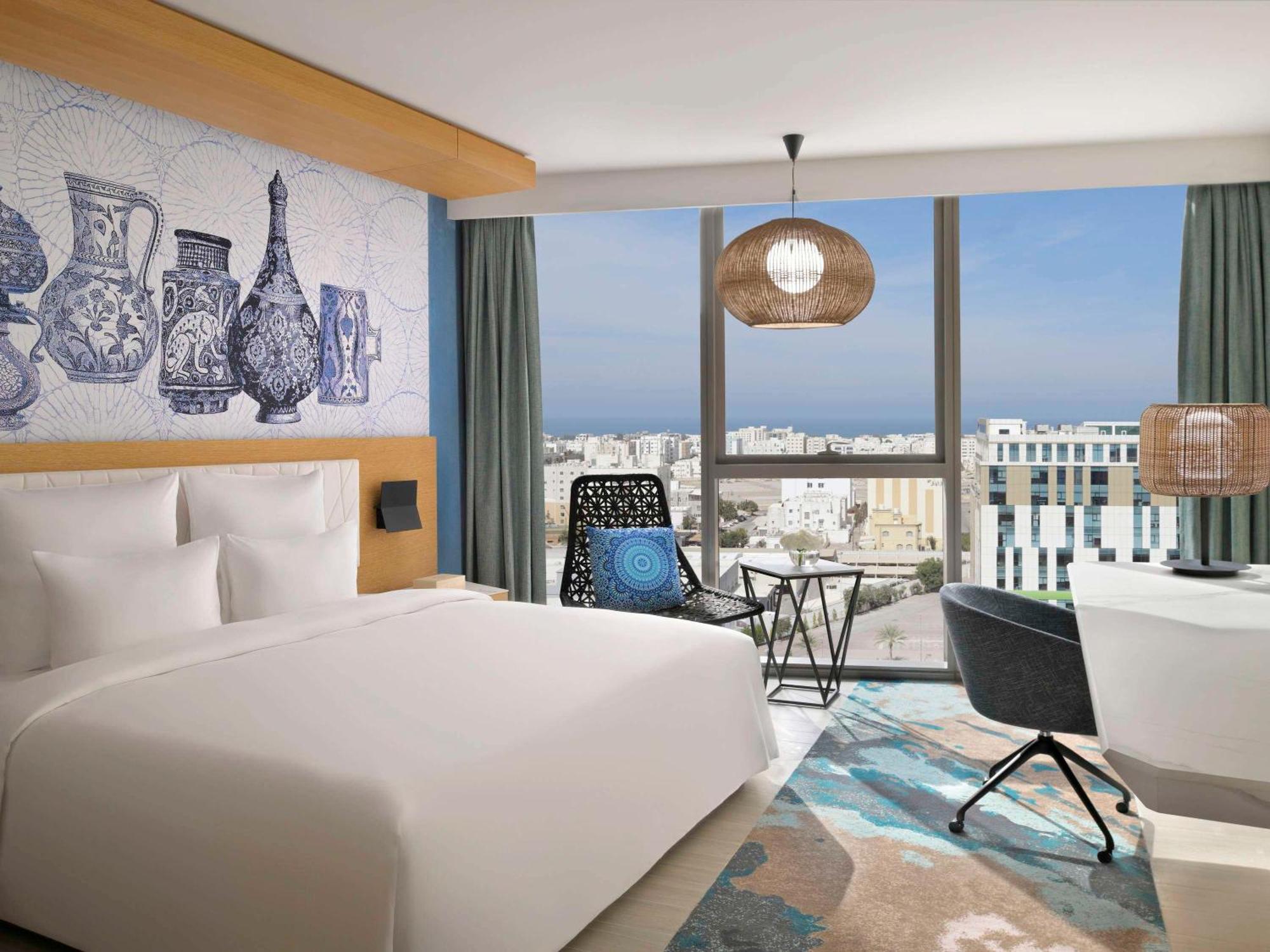 Moevenpick Hotel & Apartments Ghala Maskat Exteriér fotografie Deluxe Room